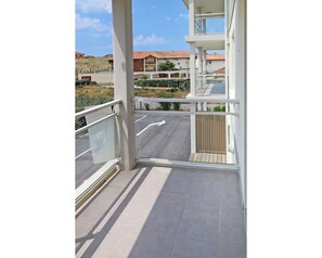 Property, Balcony, Building, House, Architecture, Apartment, Handrail, Real Estate, Room, Window