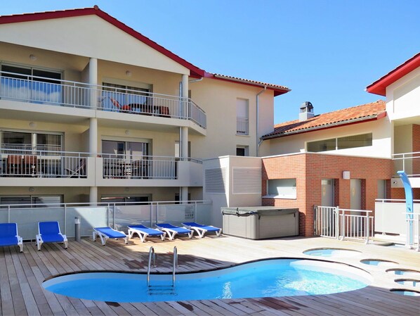 Property, Building, Water, Window, Blue, Swimming Pool, Sky, Azure, Shade, Outdoor Furniture