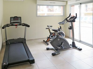 Exercise Machine, Building, Exercise Equipment, Elliptical Trainer, Stationary Bicycle, Gym, Floor, Flooring, Machine