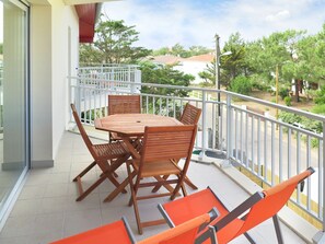 Sky, Furniture, Property, Cloud, Table, Building, Chair, Plant, Porch, Wood