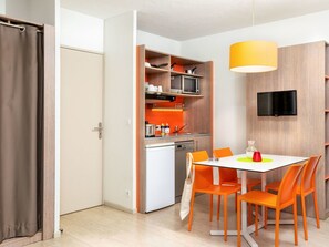 Orange, Room, Furniture, Property, Interior Design, Yellow, Building, Table, Floor, Cupboard