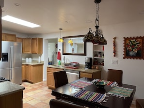 Spacious kitchen fully stocked with dishwasher, microwave, oven and stove. 