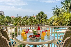 Great Balcony overlooking Pools and Palm Trees