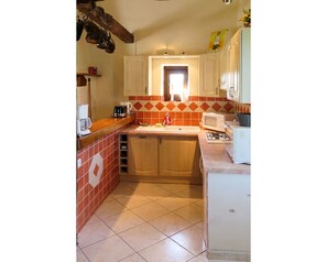 Cabinetry, Countertop, Kitchen, Sink, Wood, Plumbing Fixture, Lighting, Tap, Architecture, Interior Design
