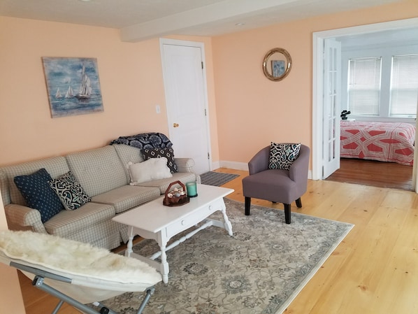 Newly renovated suite- open yet cozy at the same time. New pine floors!