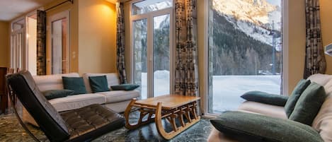 Bright living space with a view of the Argentiere Glacier