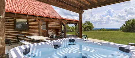 Enjoy a quiet evening in the large hot tub