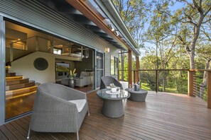 Deck with creek and mountain views