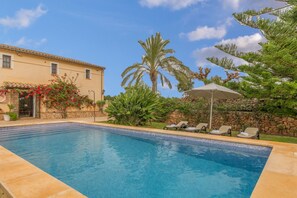 Beautiful villa with pool surrounded by nature