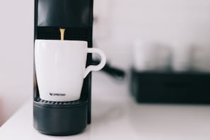 Nespresso coffee machine and coffee.