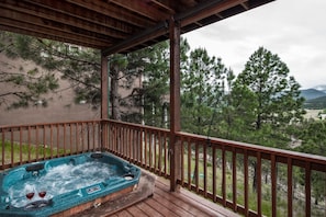 Soak Up the Scenery - The lower deck features a hot tub, the perfect spot to watch eagles soar over the mountains during the day and to marvel at the star-studded sky at night.