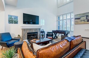 Front Living Area with Fireplace, Flat Screen Smart TV and Foosball table!

The fireplace is to not be utilized.