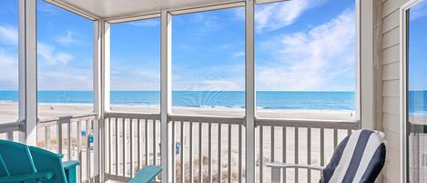 Enjoy a nice cup of coffee and unobstructed ocean views from the extra large oceanfront balcony