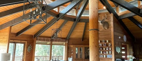 Custom built wood home w 20 foot round ceilings. 