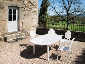 Furniture, Property, Plant, Chair, Window, Sky, Outdoor Table, Table, Outdoor Furniture, Shade