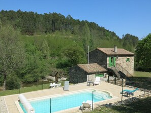 Water, Plant, Sky, Building, Tree, Swimming Pool, Outdoor Furniture, Land Lot, House, Window