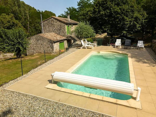 Water, Building, Plant, Swimming Pool, Tree, Outdoor Furniture, Sky, Rectangle, Shade, Wood