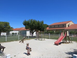 Sky, Plant, Shade, Land Lot, Tree, Building, Public Space, Leisure, Urban Design, Landscape