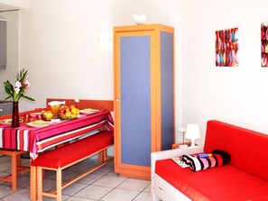 Room, Furniture, Red, Orange, Interior Design, Property, Wall, Table, Living Room, Floor