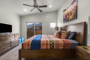 master bedroom with en-suite bath and private balcony patio
