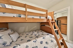 Third bedroom with queen sized bed with twin bunk on top