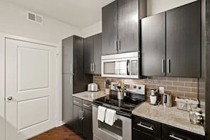 Modern stainless steel appliances in the kitchen