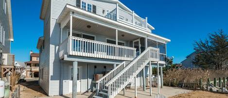 Decks galore on this fabulous home to relax and enjoy the bay breezes.