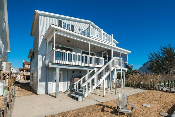 Decks galore on this fabulous home to relax and enjoy the bay breezes.