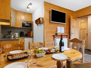 Property, Table, Cabinetry, Tableware, Food, Wood, Interior Design, Countertop, Home Appliance, Kitchen