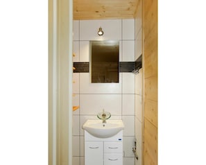 Mirror, Cabinetry, Tap, Property, Bathroom Cabinet, Furniture, Building, Plumbing Fixture, Bathroom, Wood