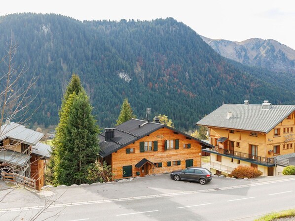 Sky, Plant, Mountain, Property, Building, Window, Wheel, House, Tree, Larch