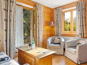 Furniture, Property, Wood, Comfort, Window, Interior Design, Living Room, Shade, Plant, Building