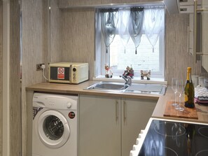 Well-equipped fitted kitchen | Seashells by the Sea - Seashore Hideaway and Seashells by the Sea, Newbiggin-by-the-Sea
