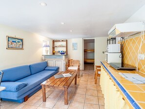 Furniture, Table, Property, Cabinetry, Picture Frame, Couch, Building, Azure, Window, Shelf