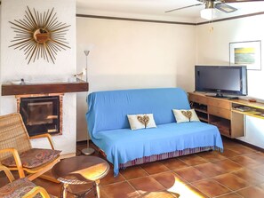 Furniture, Picture Frame, Property, Couch, Table, Comfort, Azure, Wood, Living Room, Interior Design