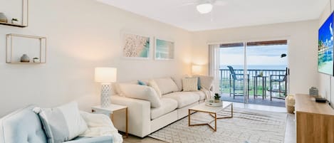 Bright and beachy living room with a view!