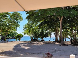 Your view from our back deck . Feel the warm sand and hear the calming waves 