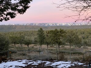 View of the Rim with snow from the backyard