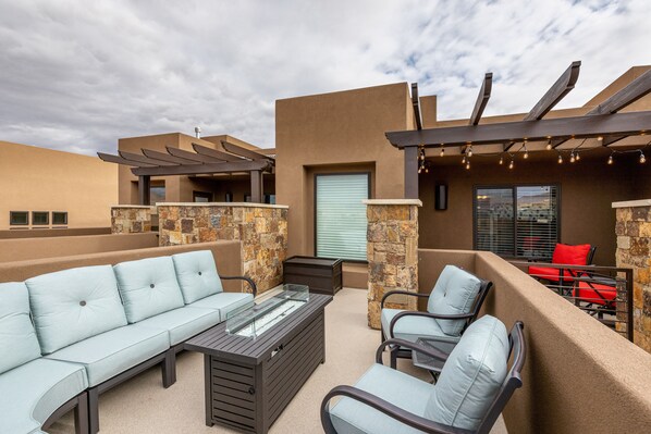 Upstairs Patio Furniture & Fire Pit - This deck is the perfect place to enjoy the weather of St. George!