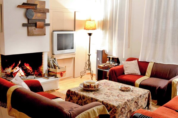 The modern living room with the fireplace