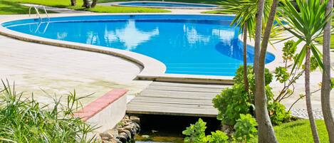 Fantastic pools in landscaped gardens in luxury condominium