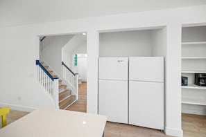2 refrigerator/freezers in the kitchen