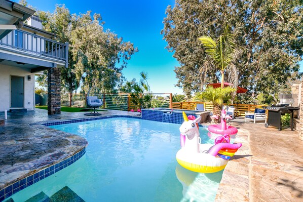 Large private heated pool with fun unicorns and flamingos!
