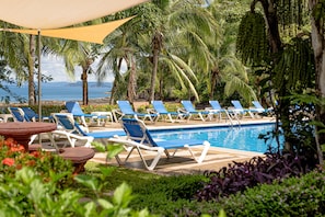 Relax around the main pool with a beverage or appetizer from Maracuya Beach Club