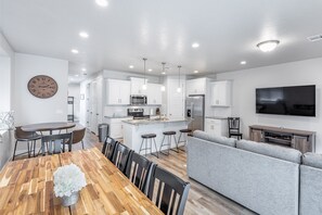 Dining Table View - With an open and spacious floor plan, the Dining Room and Kitchen can accommodate meal preparations for groups large or small.