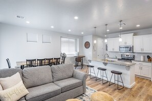Family Room - The Living Room is conveniently located adjacent to the Kitchen and Dining Table and is a great place for entertaining guests during downtime.