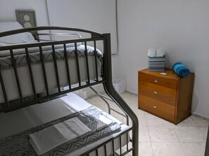 Guestroom has a bunk bed with twin on top bunk and lower bunk has a full bed