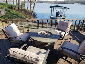 Enjoy sitting by the fire with a view using the propane fire pit.