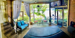 Enclosed screened in patio to help with the summer heat, bugs and rain.