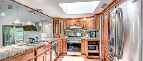 Kitchen with Stunning Cabinetry and Granite Counters